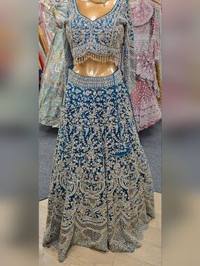 Embroidered Teal Blue Bridal Lehenga with Gold Embellishment